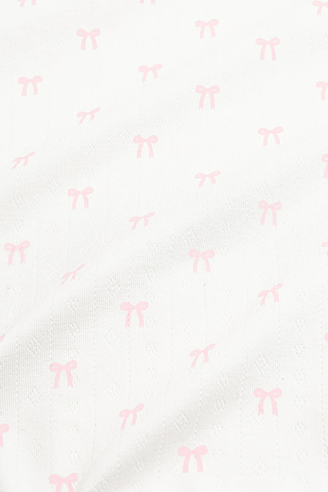 Kyte Baby Pointelle Zippered Footie with Picot Trim - Sweet Pink Bow